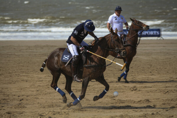 Polo on beach